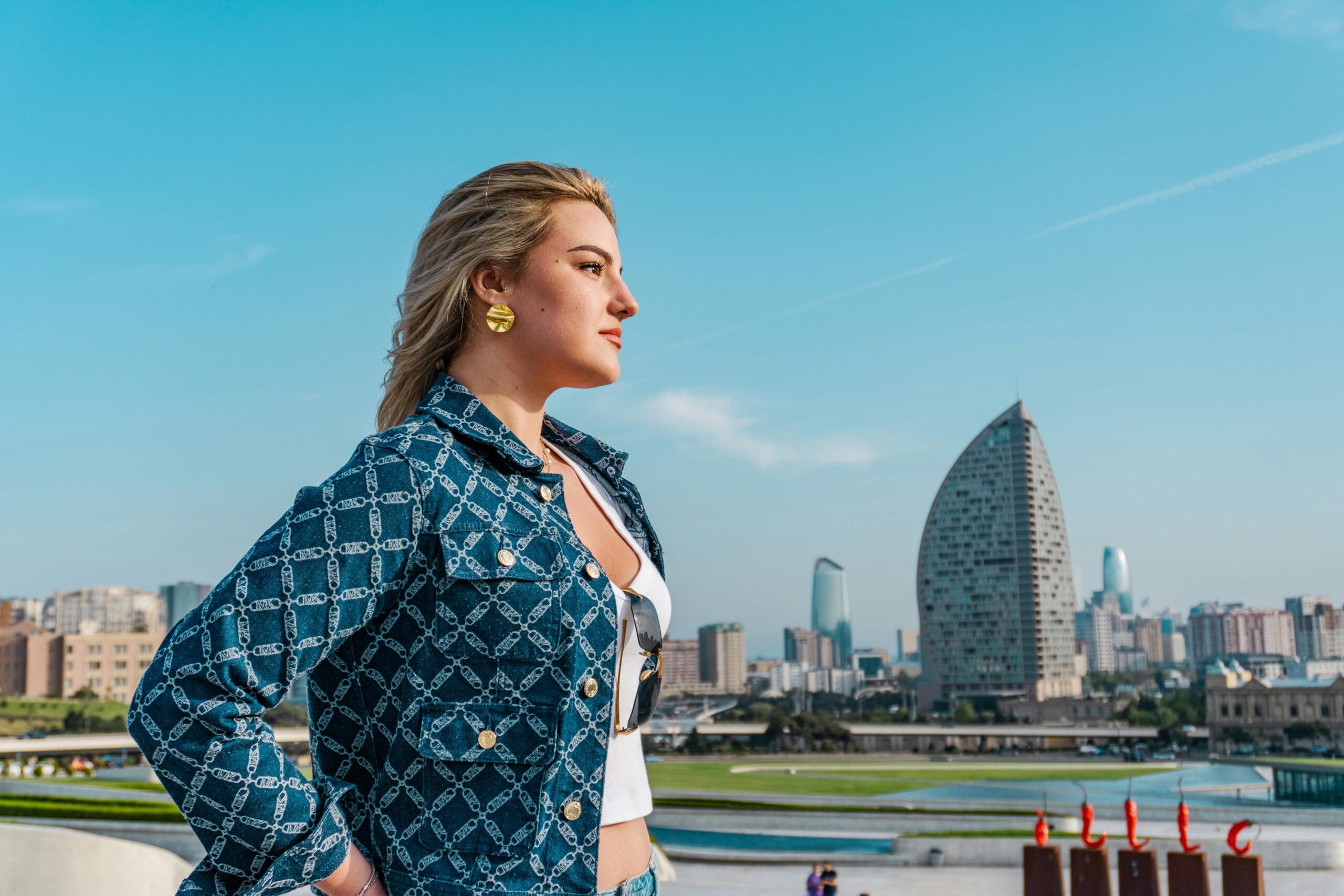 Golden Retriever confidently wearing a service vest despite sidewalk distractions